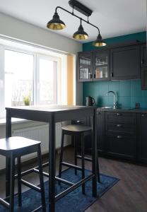 A kitchen or kitchenette at Apartment Secret