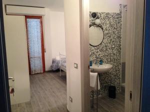 Koupelna v ubytování Residenza Cisanello