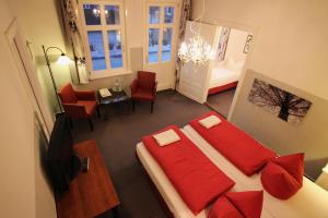 Postel nebo postele na pokoji v ubytování Hotel Garni Zur Linde