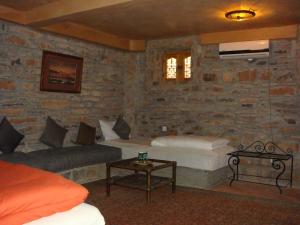 Kasbah Hotel Ait Omar客房内的一张或多张床位