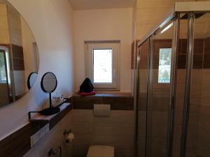 Koupelna v ubytování Appartements Bergliebe