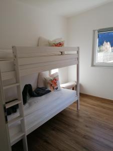 Postel nebo postele na pokoji v ubytování Appartements Bergliebe