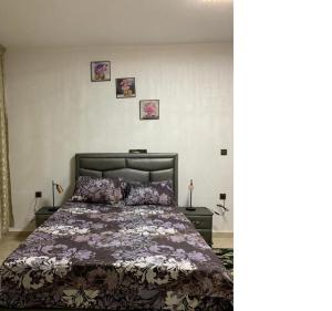 Een bed of bedden in een kamer bij Mustafa's House