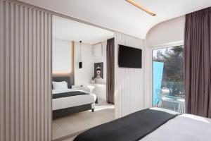 Postel nebo postele na pokoji v ubytování Mirada Hotel