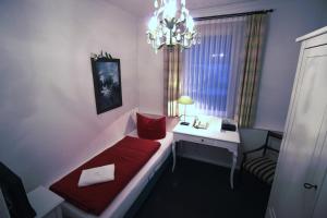 Postel nebo postele na pokoji v ubytování Hotel Garni Zur Linde