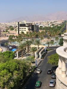 a view of a city with cars driving down a street at Dweik Rooftop in Aqaba