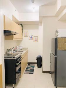 The Celandine by DMCI tesisinde mutfak veya mini mutfak