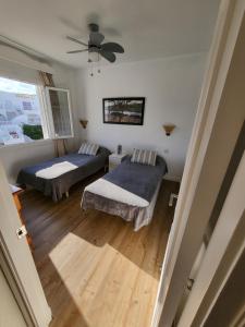 En eller flere senge i et værelse på Appartement vue sur mer Apartamento vista al Mar Sea View apartment