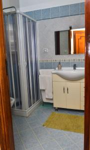 A bathroom at Amaryllis Apartments