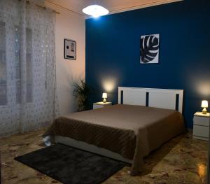 A bed or beds in a room at Amaryllis Apartments Még 19 kép