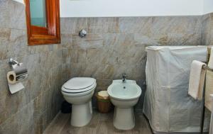 A bathroom at Amaryllis Apartments