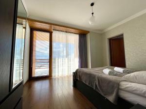 Letto o letti in una camera di Gudauri Hillsite