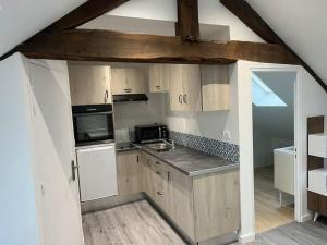 Kuchyň nebo kuchyňský kout v ubytování 2 Appartement neuf centre ville proche gare et commerces