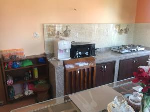 eine Küche mit einer Arbeitsplatte und einer Kaffeemaschine in der Unterkunft Apartment at Balkot, Nepal in Thimi