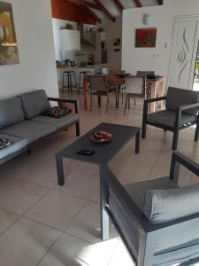 Posezení v ubytování villa Philexiane