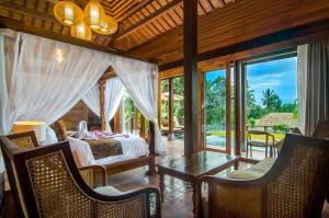 Posezení v ubytování Danakha Villa Ubud