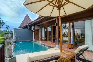 Bazén v ubytování Danakha Villa Ubud nebo v jeho okolí