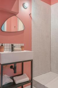 Ванная комната в Charmant studio tout confort en cœur de ville
