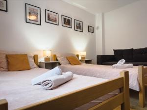 מיטה או מיטות בחדר ב-Apartman Lokum