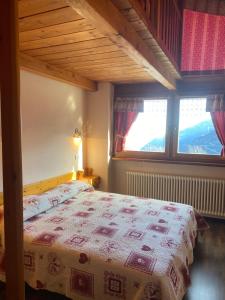 Postel nebo postele na pokoji v ubytování Le Chemin de La Luge