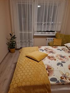 Posteľ alebo postele v izbe v ubytovaní OLIVIA
