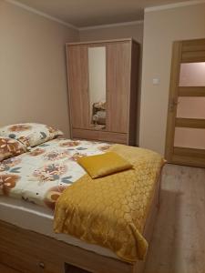 Кровать или кровати в номере OLIVIA