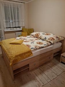 Posteľ alebo postele v izbe v ubytovaní OLIVIA
