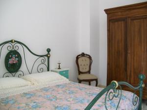 Postel nebo postele na pokoji v ubytování Notte di Luna