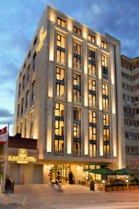 a large building with lights on top of it at Kahya Hotel Ankara in Ankara