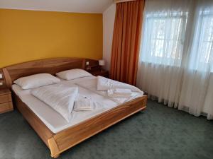 Postel nebo postele na pokoji v ubytování Pension Reiterhaus