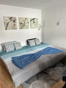 Tempat tidur dalam kamar di BFE Waldseele