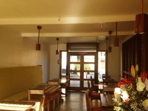 מסעדה או מקום אחר לאכול בו ב-Aroma Verde Hotel