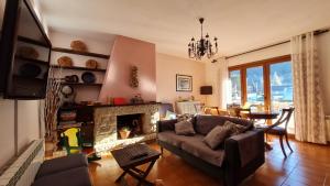 TV a/nebo společenská místnost v ubytování Apartament Vent de Port