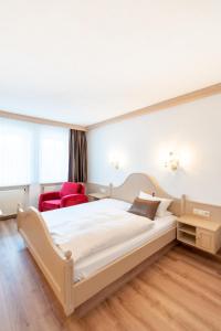 Postel nebo postele na pokoji v ubytování Hotel Eisensteiner Hof