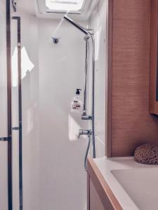 a bathroom with a shower and a sink at Croatia by Luxury Catamaran in Split