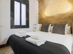 Posteľ alebo postele v izbe v ubytovaní New Listing DUPLEX NEAR THE BEACH Barceloneta