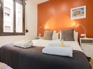 Posteľ alebo postele v izbe v ubytovaní New Listing DUPLEX NEAR THE BEACH Barceloneta