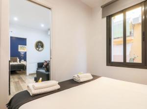 Posteľ alebo postele v izbe v ubytovaní New Listing DUPLEX NEAR THE BEACH Barceloneta