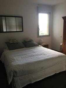 Posteľ alebo postele v izbe v ubytovaní Appartement T3 à 2mn de la Plage