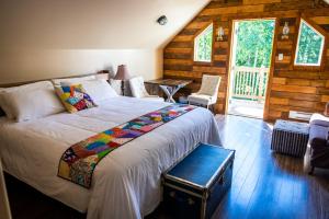 Postel nebo postele na pokoji v ubytování Upper Humber Settlement a FarmStay B&B