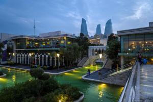 a view of a city with buildings and a river at Dondar Hotel Formula 1 View in Baku