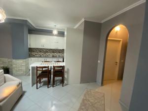 Kuchyň nebo kuchyňský kout v ubytování Moni Apartments + 5 fotografií