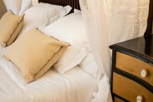Posteľ alebo postele v izbe v ubytovaní Hotel Palacio De Luko