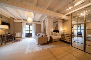 Posteľ alebo postele v izbe v ubytovaní Hotel Palacio De Luko