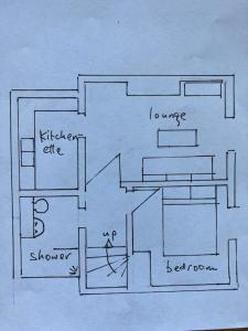 a drawing of a floor plan of a house at Charming 1 bed loft in 16C house in city centre in Norwich