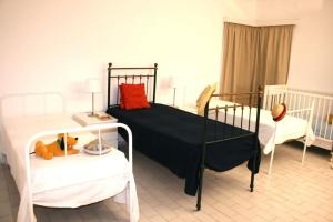 Postel nebo postele na pokoji v ubytování Casa do Bosque