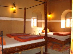 Kasbah Hotel Ait Omar客房内的一张或多张床位
