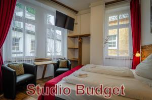 Postel nebo postele na pokoji v ubytování MoselUnion - Aparthotel Landsknecht