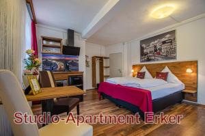 Postel nebo postele na pokoji v ubytování MoselUnion - Aparthotel Landsknecht