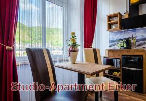 TV a/nebo společenská místnost v ubytování MoselUnion - Aparthotel Landsknecht + 26 fotografií